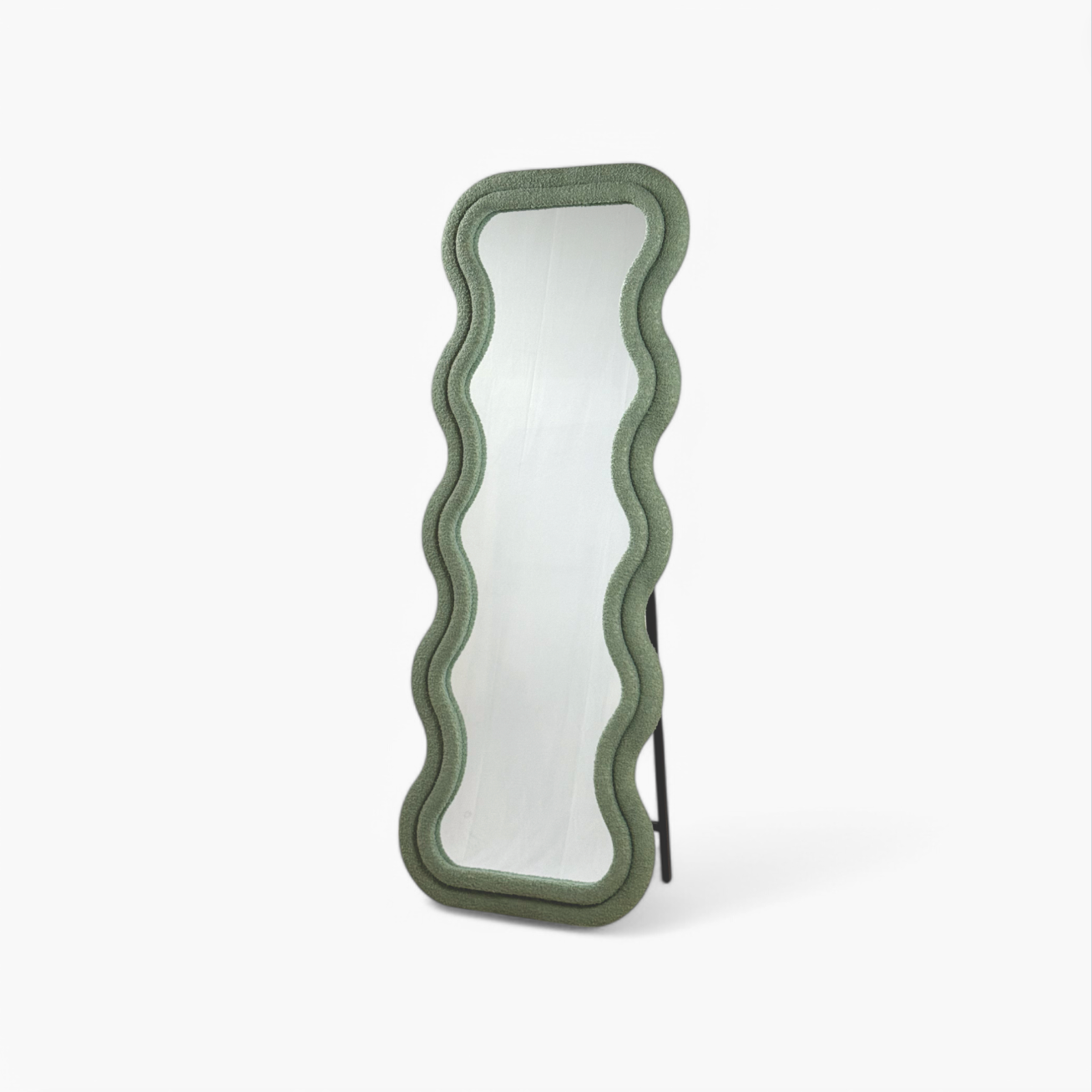 Furnology wavy frame standing mirror with a textured green frame and full-length reflective surface