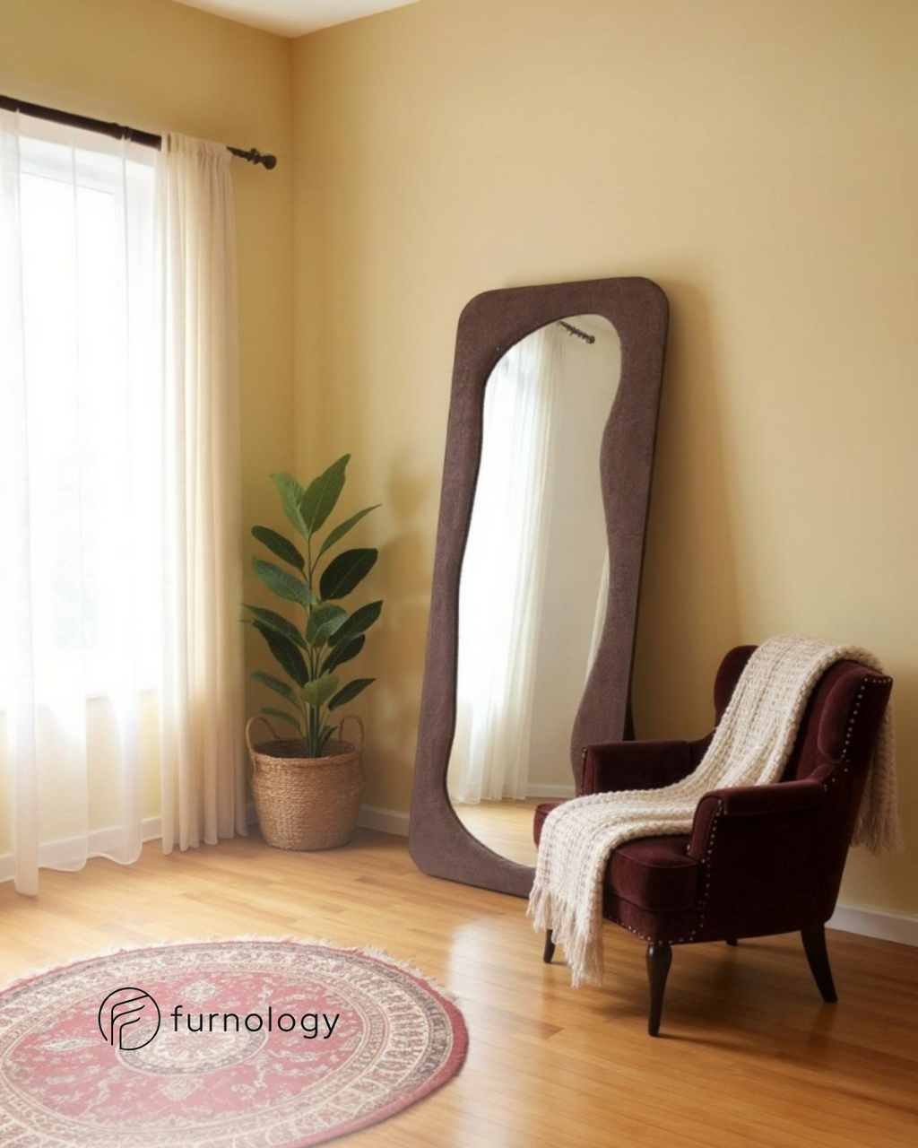 Furnology artistic frame full length mirror with curved edges leaning against wall in cozy room