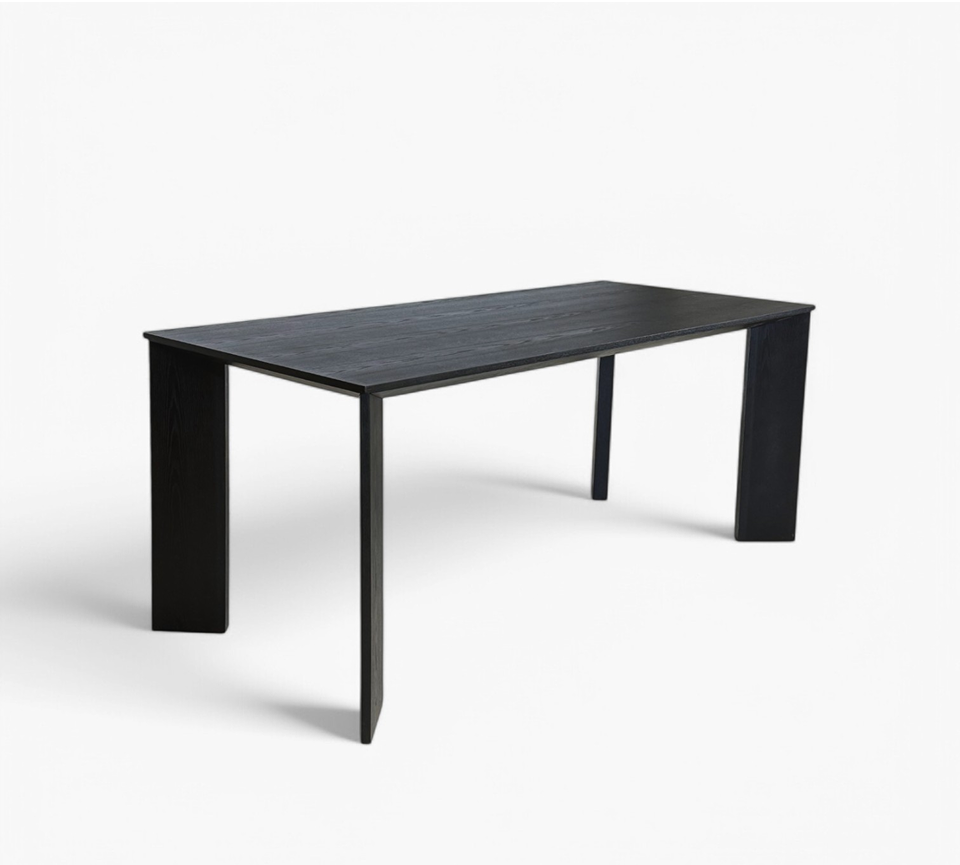 Furnology contemporary black dining table with sleek design and sturdy legs for modern dining spaces