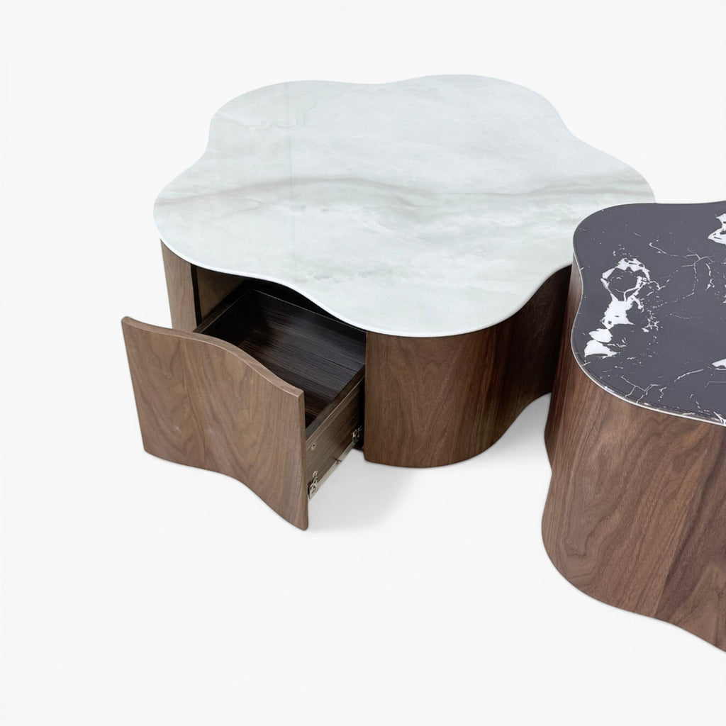 Furnology Norma coffee table with white marble top and wood base, featuring a flower shape and open drawer.