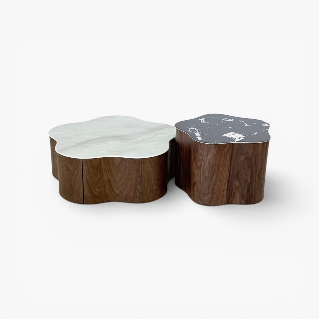 Furnology Norma nested coffee tables with white and black marble tops and wood bases in a flower shape.