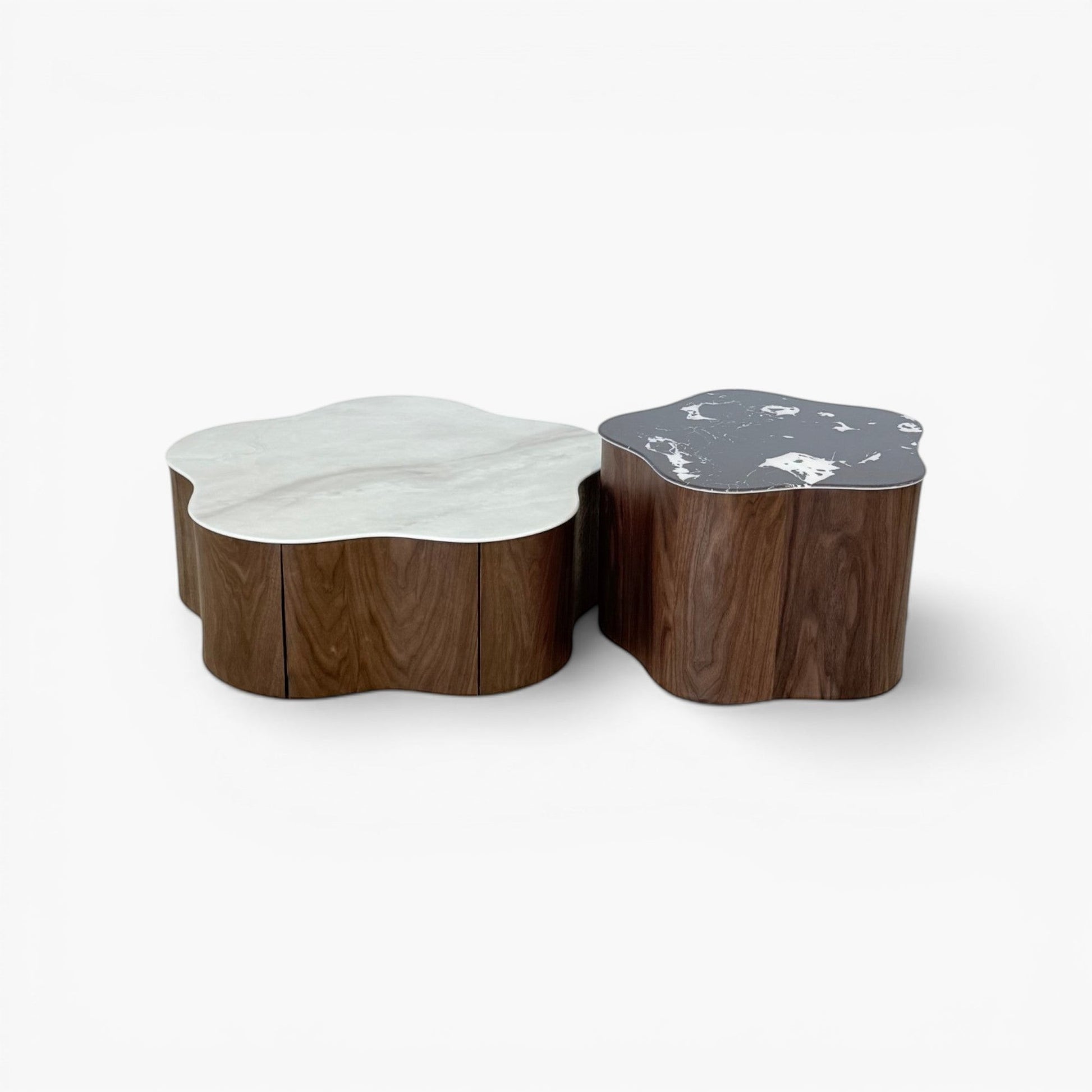 Furnology Norma nested coffee tables with white and black marble tops and wood bases in a flower shape.