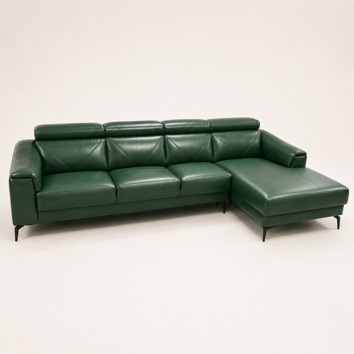 Verdant L-shaped leather sectional in deep green, studio
