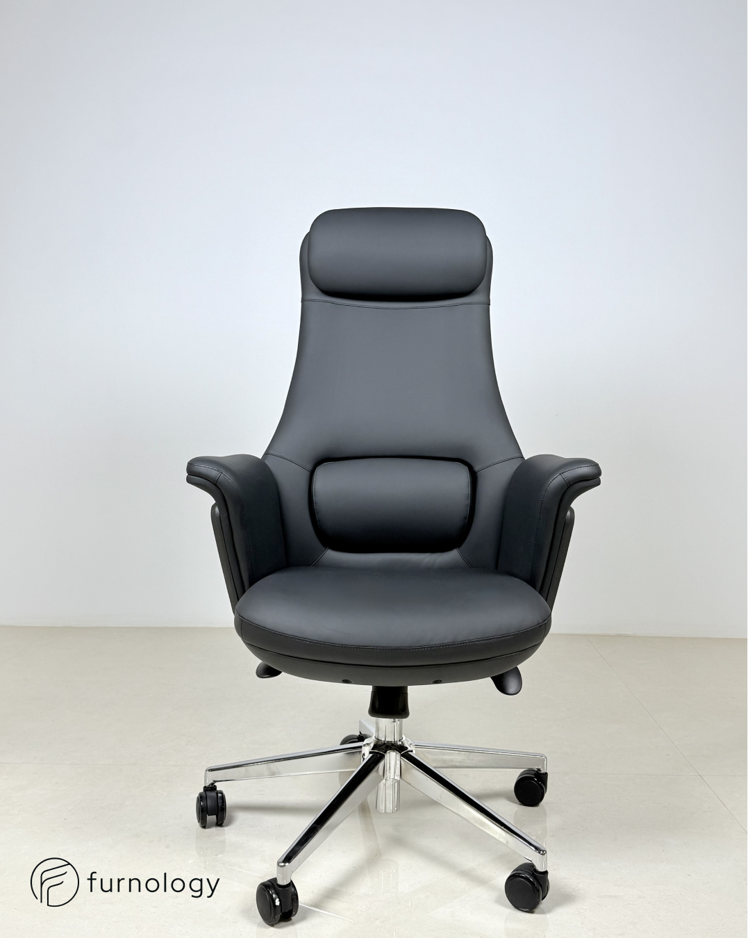 Furnology modern executive chair for home office with black cushioned seat and chrome base wheels