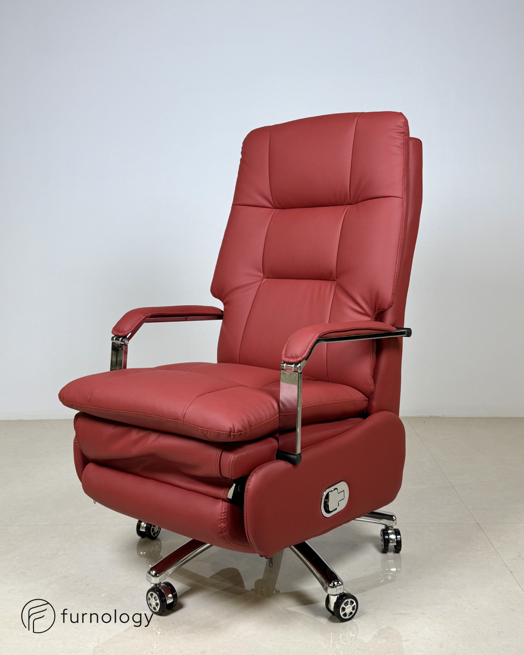 Furnology reclining executive office chair in red leatherette with padded armrests and adjustable footrest