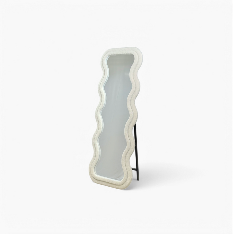 Furnology wavy frame standing mirror with white textured border and black metal support stand